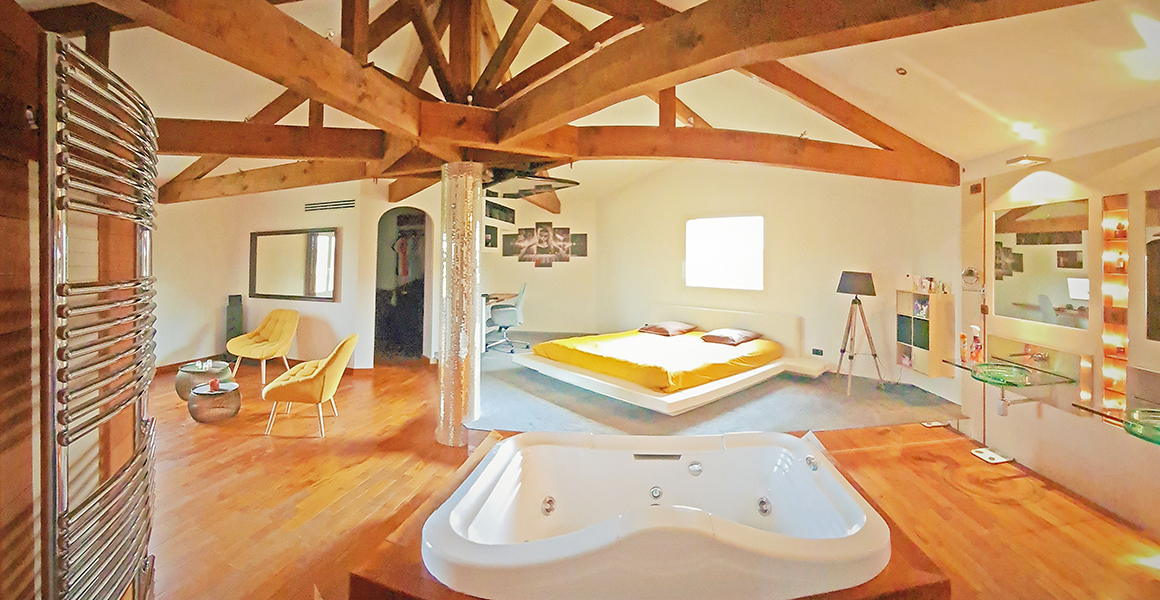 The master suite and jacuzzi on the first floor