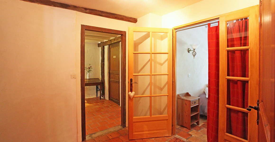 The reading area leads to the accessible double bedroom, WC and bath/shower room
