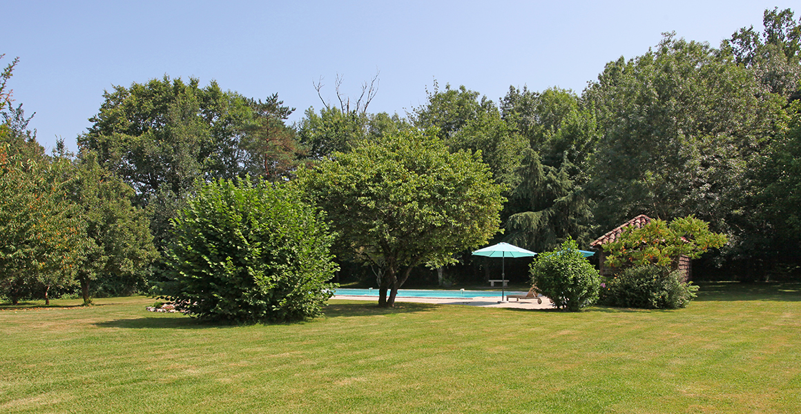 View from the side terrace towards the garden and pool