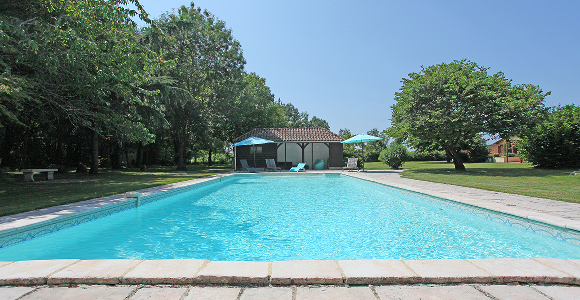 The pool and summer house
