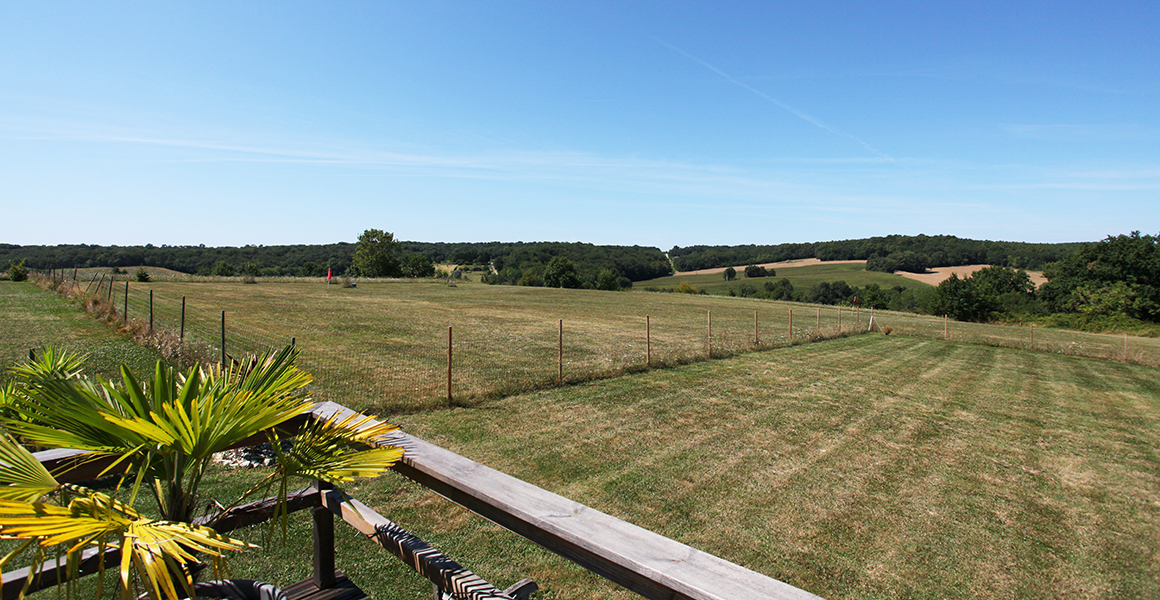 View from the decked terrace across the grounds towards the pitch and putt course