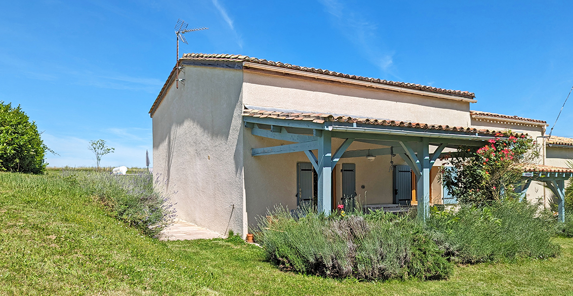 The front of the house with covered terrace