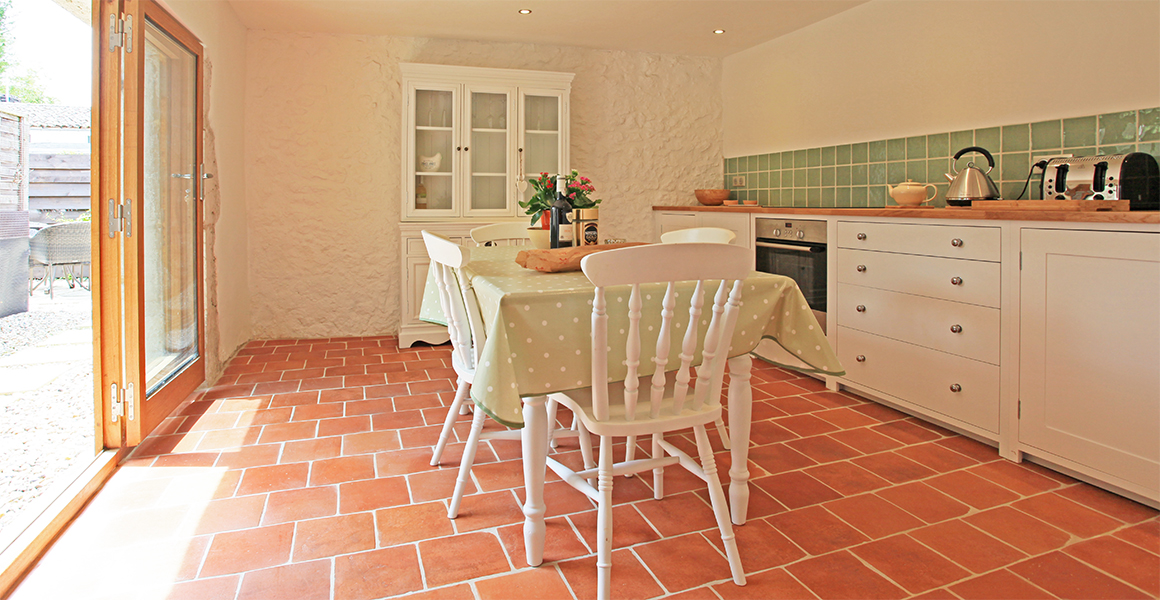 The kitchen opens out onto the courtyard